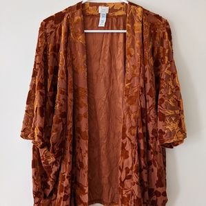 A bronze colored cardigan